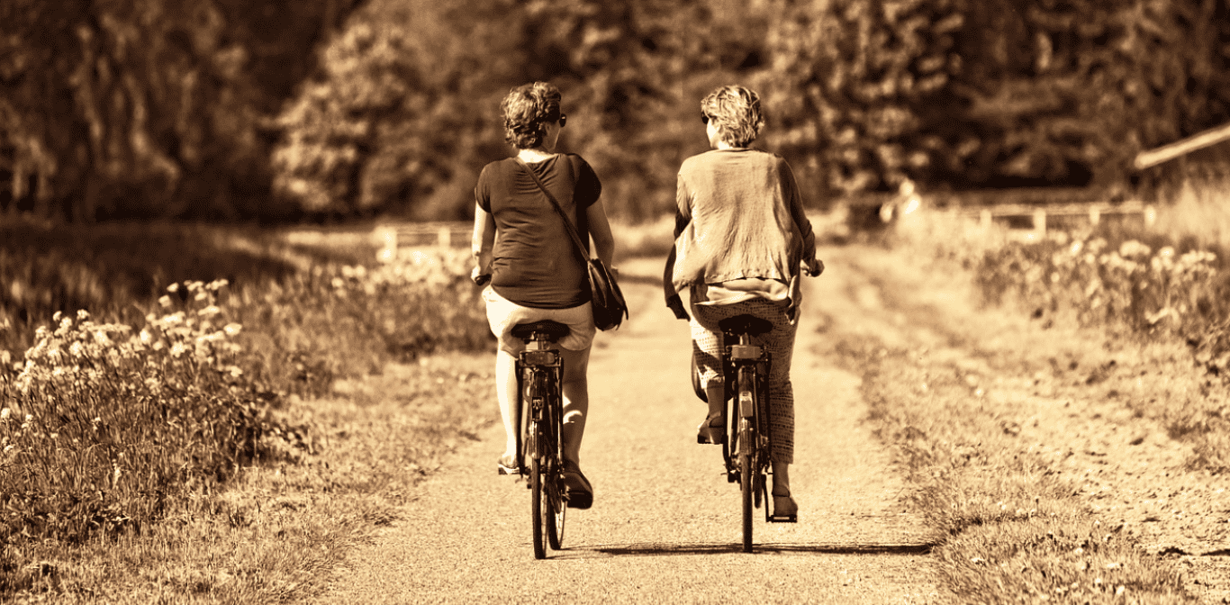 two women on bikes