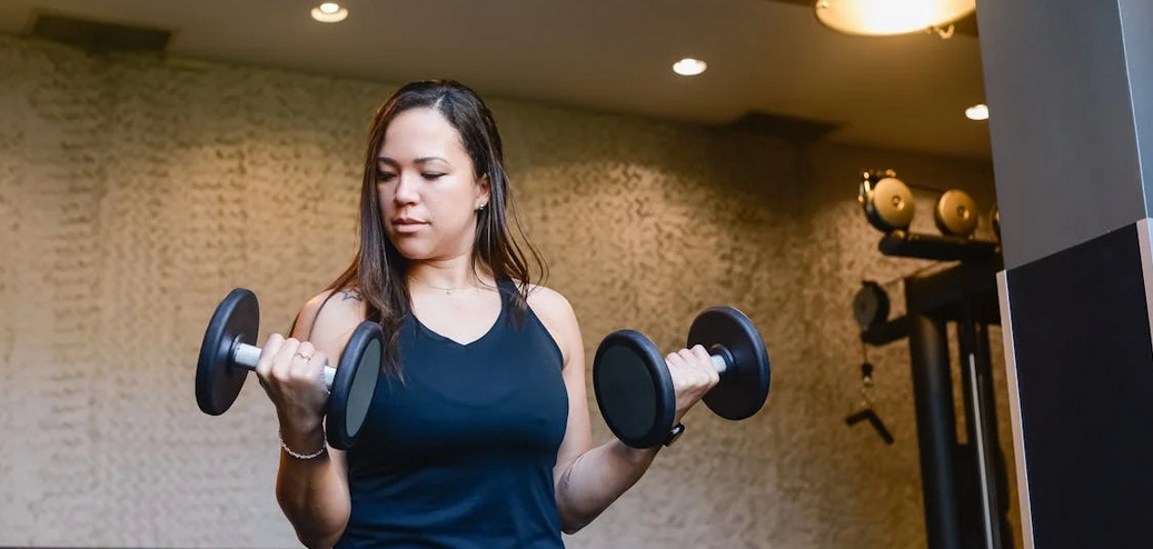 woman doing weight training